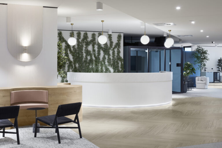 office reception area with seating and desk